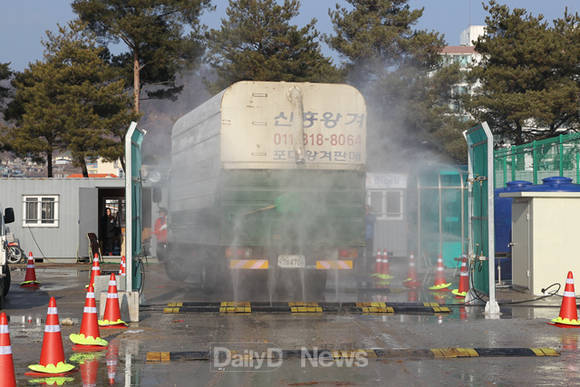 사진은 구제역 예방 소득 장면