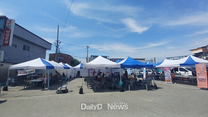 의홍 전통시장에서 ‘자원봉사가 꽃피는 오일장’ 행사 개최