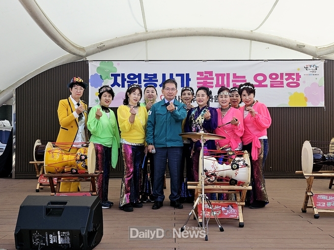 군위전통시장에서“자원봉사가 꽃피는 오일장”개최